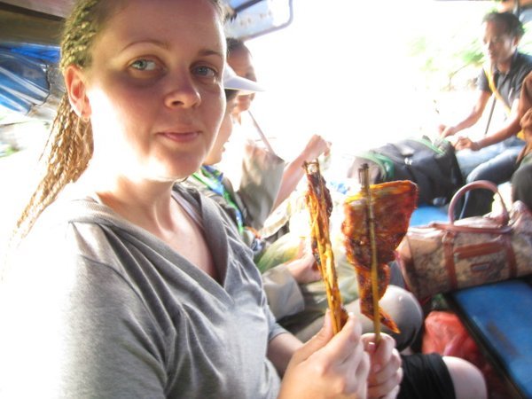 Meagan with her chicken on a stick