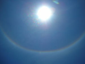sun with a rainbow right round it