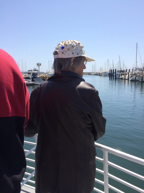 Mom at the bow of the harbor boat - ready to see some wildlife!