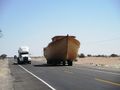 Boat on the road through the desert...go figure