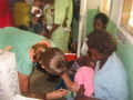 Giving immunizations at Outreach 