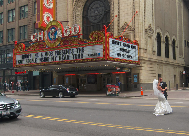 Wedding Couple in front of Chicago theatre