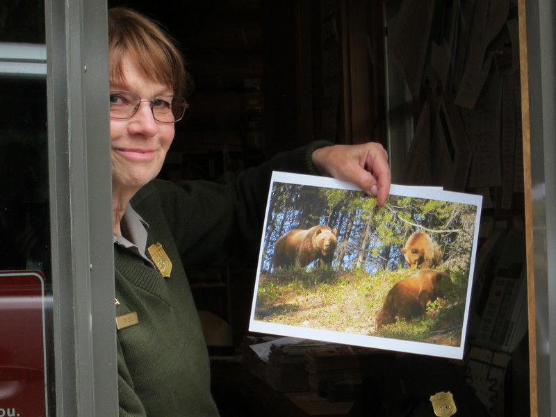 Proud park ranger and her grizzly photos