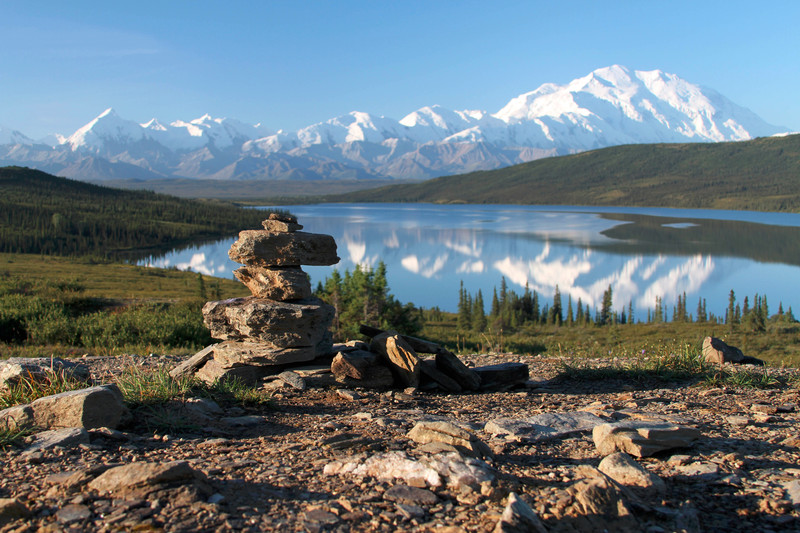 Cairns on  Bluebery Hill with Denali reflection in Wonder Lake