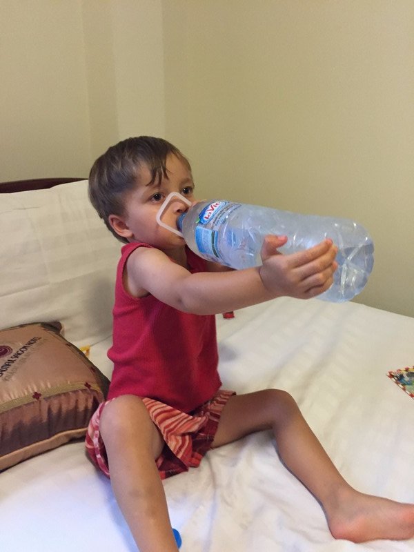 Agus handling a big water bottle
