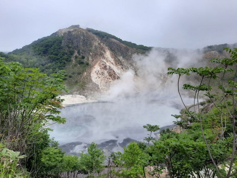 Steaming sulphurous pond at Noboribetsu