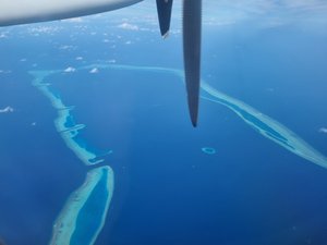 Standard view of a Maldivian atoll from the domestic flight to Fuvahmulah