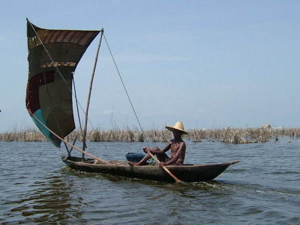 An Old Tofinu Man Sailing Home