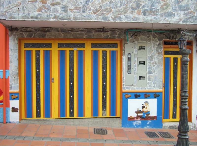 Painted facade of a cobbler's