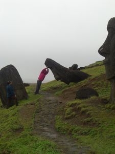 Imogen holding up a moai