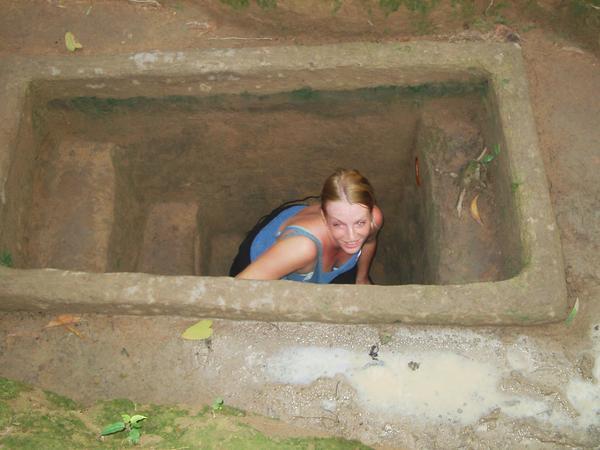 Ro ererging from the one of the Cu Chi tunnels