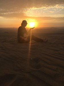 Vicks holding the sun in the desert