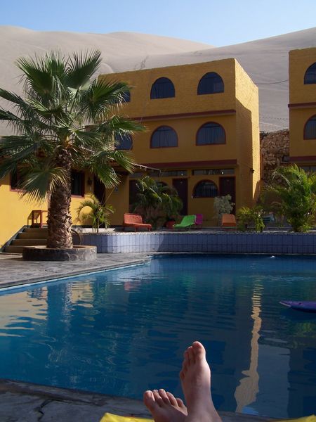 Relaxing by the pool in Huacachina