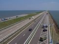 The Afsluitdijk stretching off into the distance