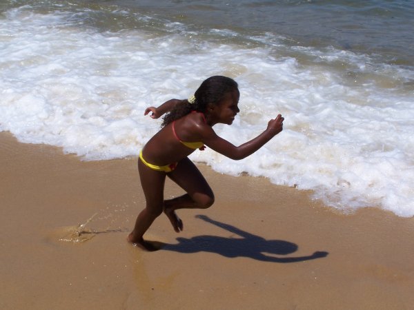 Child playing beach, Rio de Janeiro