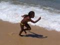 Child playing beach, Rio de Janeiro