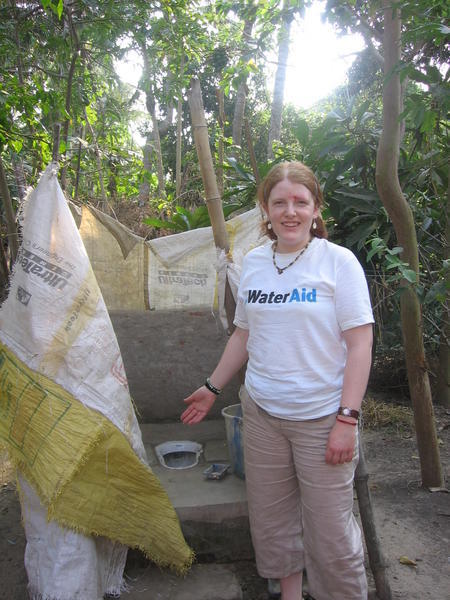 Sarah by one of the new latrines