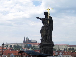 Statues on the Charles Bridge watching over St. Vitas Cathedral in the background