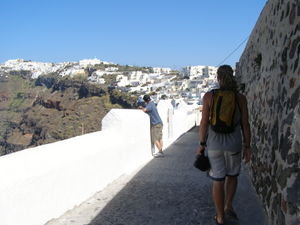 Walking towards Firostefani on the clifftop path