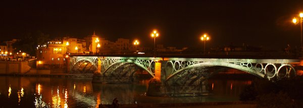 Puente de Isabel II at night