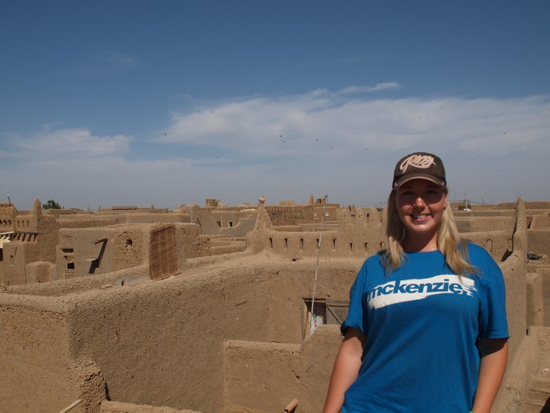 Bunny with the rooftops of Djenne behind her