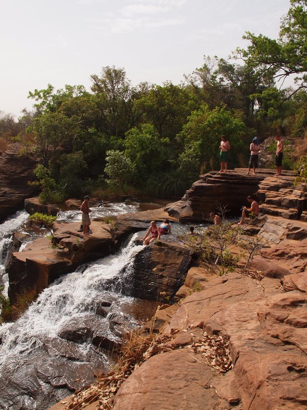 The gang having a refreshing dip at Karfiguela Falls