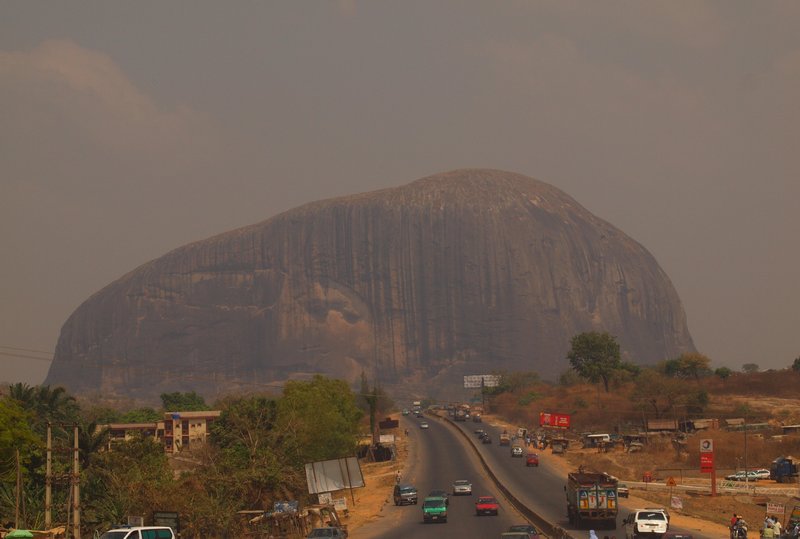 Random rock in Nigeria towers over the motorway