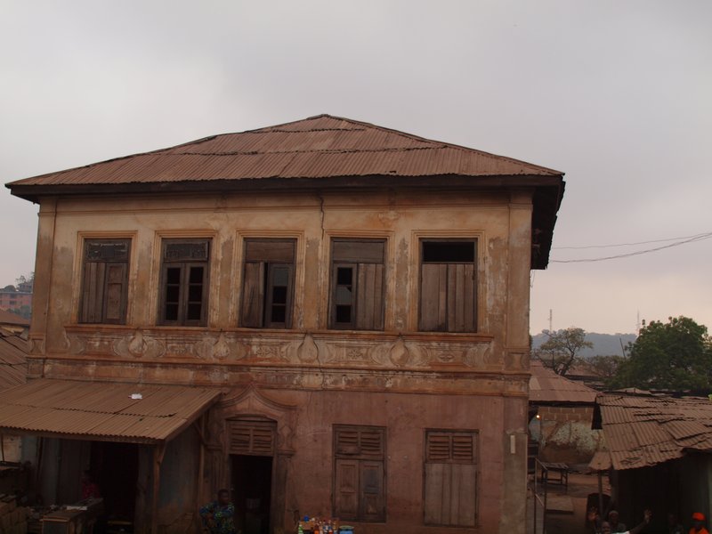 Ok its kind of cut off... the truck was moving... but Nigeria was littered with cool old wooden colonial buildings...