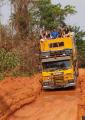 The mighty truck forges through the enormous mud holes
