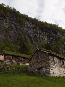 Skagefla farm on its mountain ledge above the fjord