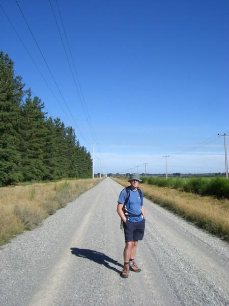 Ian on a very very long straight road in Canterbury