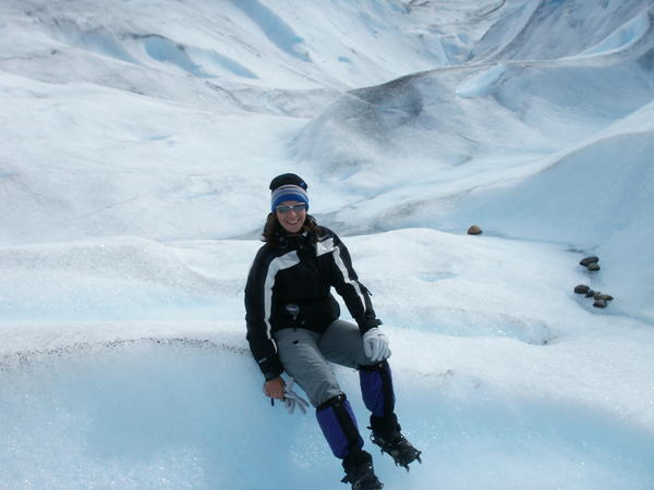 Mira sitting on Perito Moreno Glacier