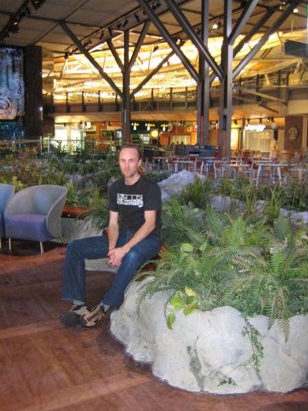 Jono sitting by the creek... in the airport