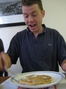 an enthusiastic pancake eater