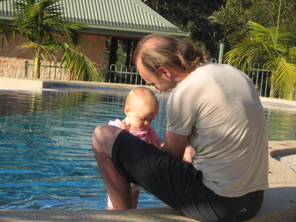 Leila and Dad in the pool