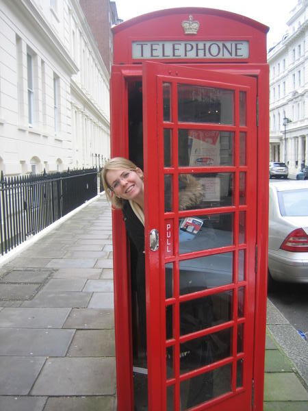 Kristen in traditional phone booth