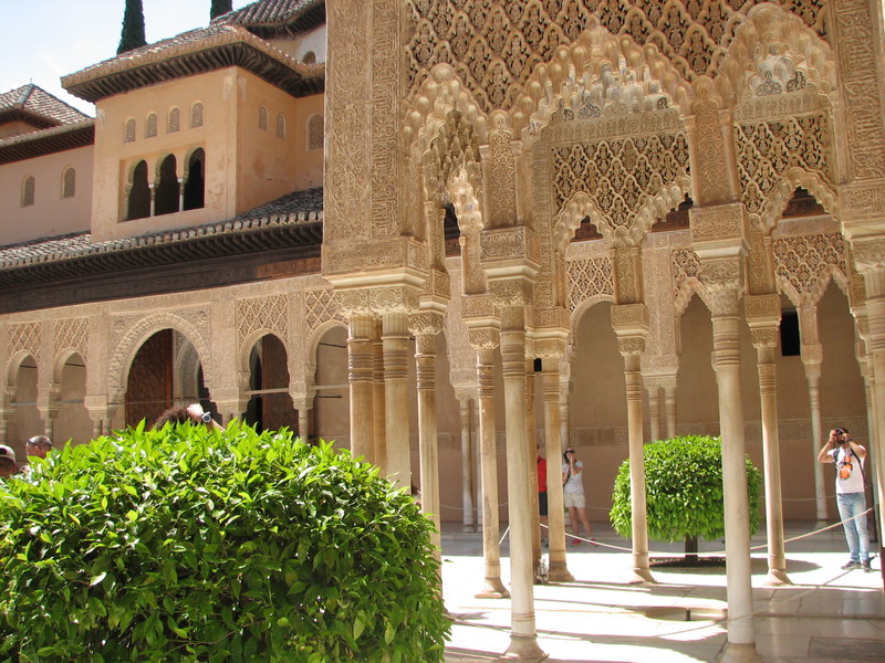 Walking in a beautiful Arab patio in Alhambra