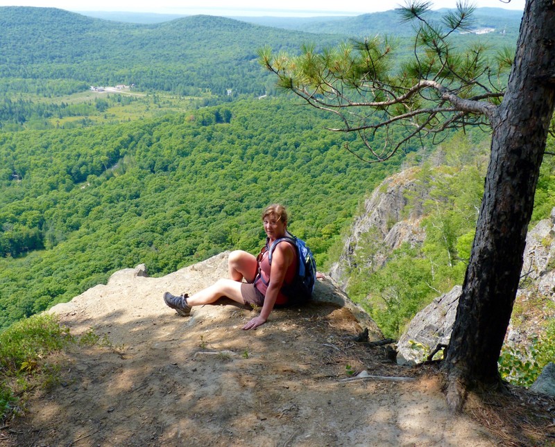 Eileen resting after a hard hike to the summit