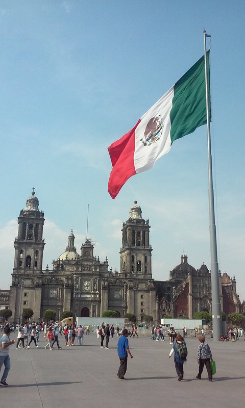 Mexican flag and cathedral, Plaza de la Constitucion