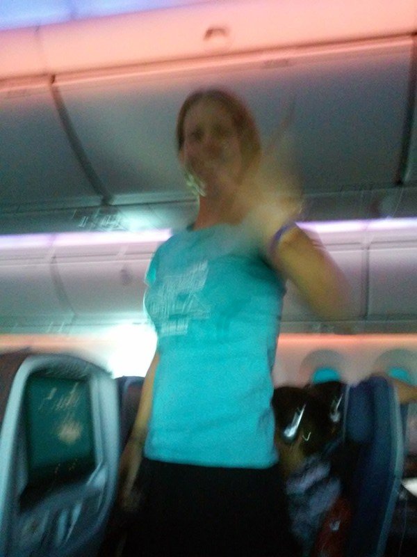 Fi stretching out during the flight from LAX to Santiago