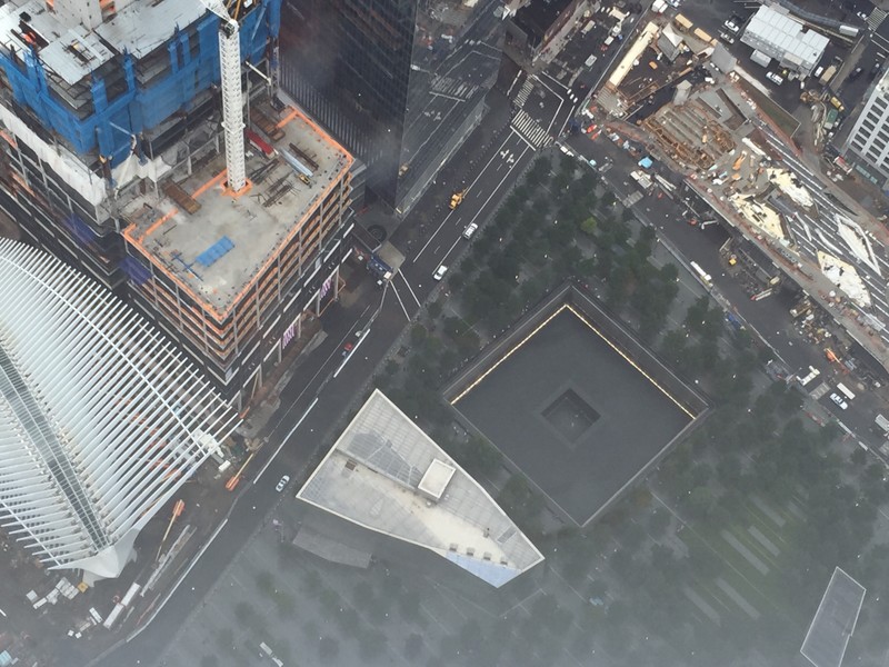 Looking down from the Freedom Tower to the memorial 