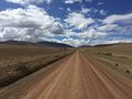 Long straight dirt road in the Cuzco region 