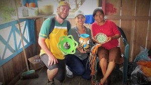 Renee and Pete with a local making gear for market