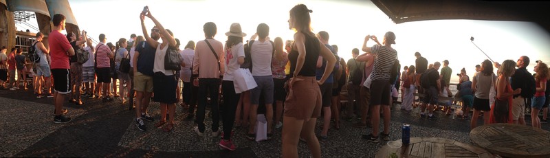 Panoramic of people lining up for the sunset shot