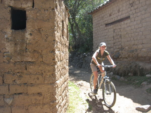 Biking through a small village in Huraz
