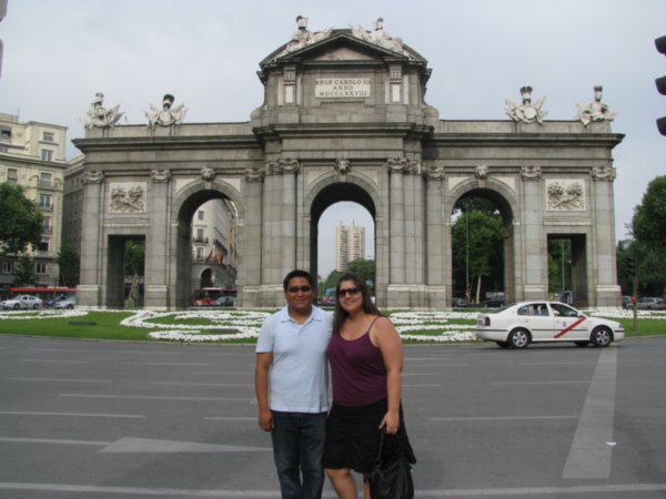 us at monument near the entrance to Retiro Park