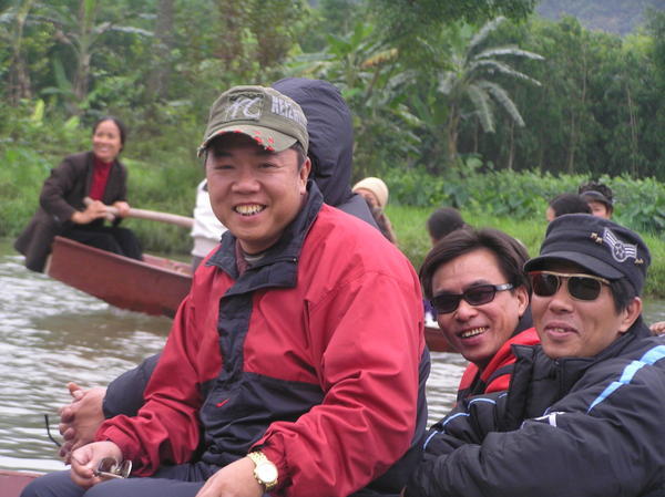 Men smiling in boat
