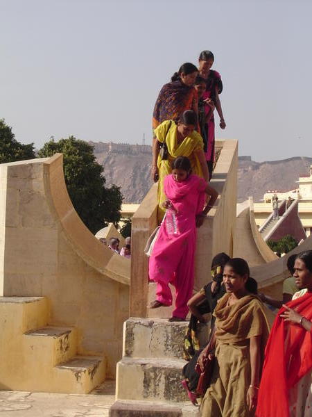 ladies climbing the sun dials at the onservatory