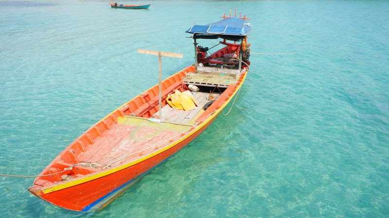A longtail boat standing in as a scuba diving boat...