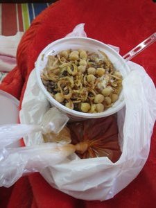 pics not allowed in those museums, but i did get a snap of this Kosheri...rice, noodles, lentils, chickpeas, some red sauce and garlic water. for 80 cents! delicious!!!
